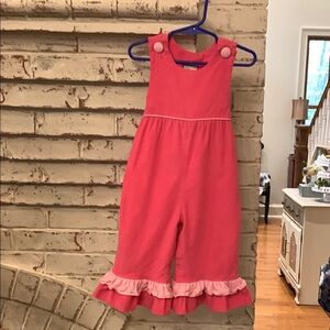Shrimp and Grits Kids Vibrant Pink Romper with Ruffle Hem and Wide Legs